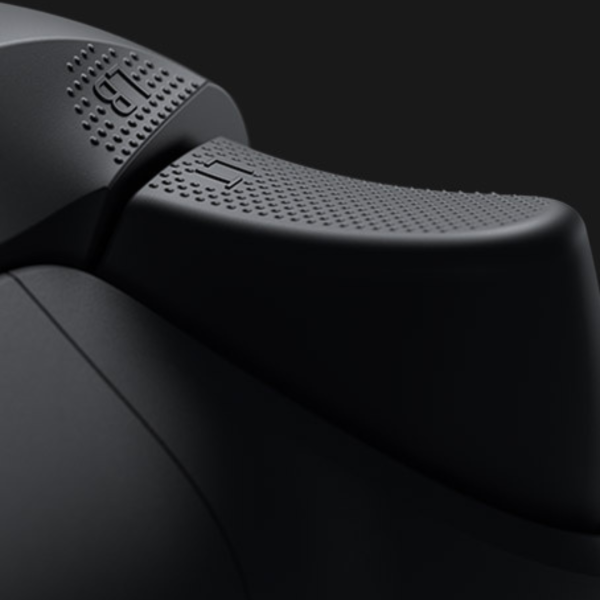 Xbox Wireless Controller close-up showing trigger button and grip texture