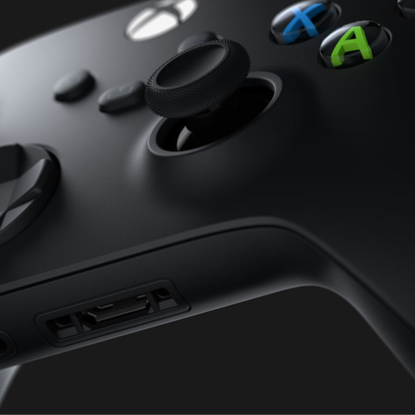 Close-up of Xbox Wireless Controller with focus on thumbsticks and A, X buttons